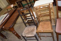 Two cane seated chairs and a rush seater ladder back chair