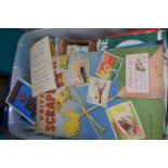 Plastic box containing scrap books with cigarette cards, various old maps, quantity of loose