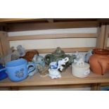 Quantity of ceramics and carved wooden models including novelty teapots etc