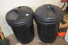 Two black dustbins