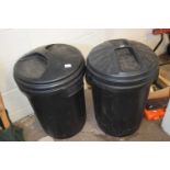 Two black dustbins