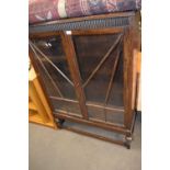 An early 20th Century glazed display cabinet, 90cm wide