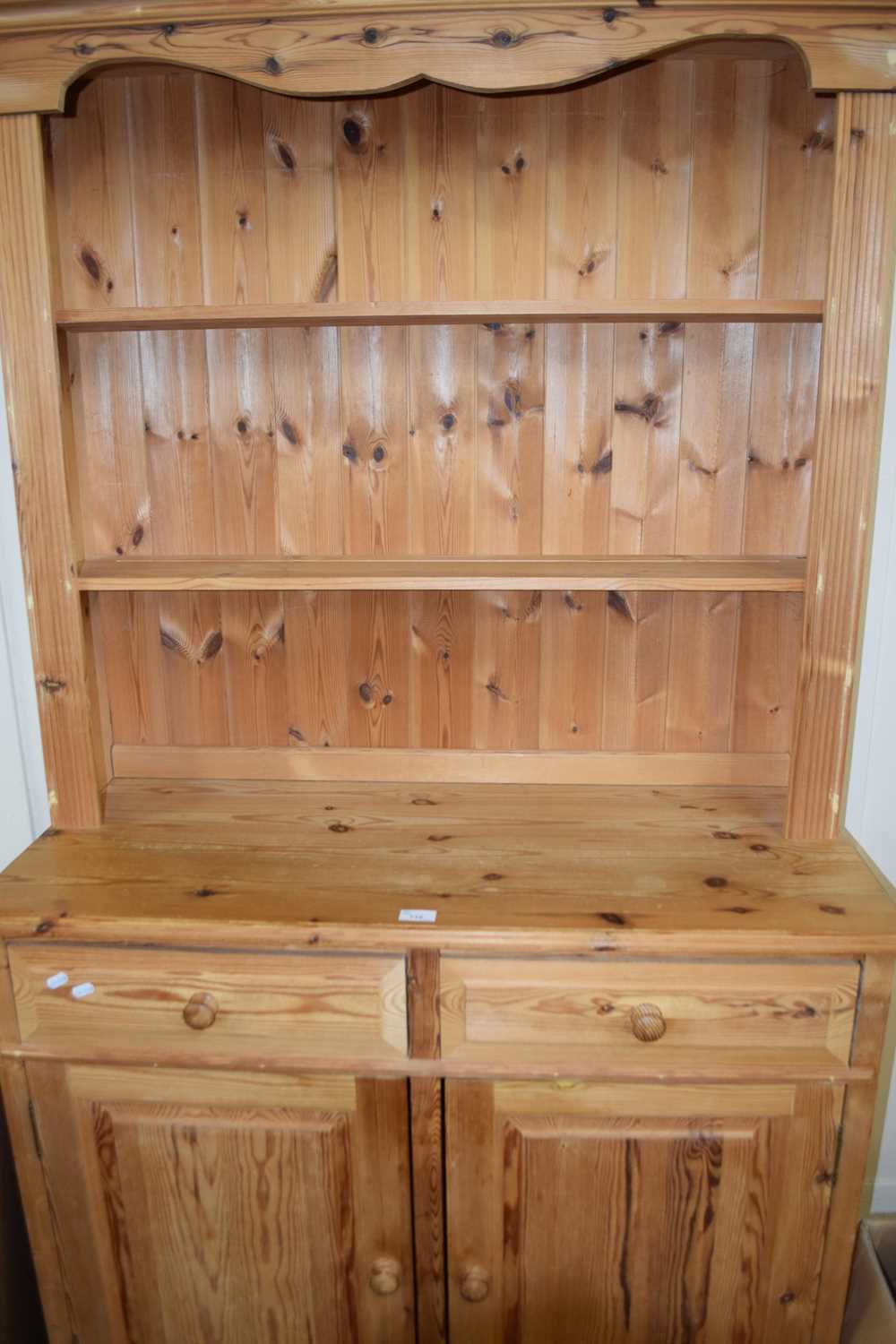 Pine cabinet with shelves above, drawers and cupboards below, 105cm wide