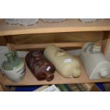 Three vintage foot warmers or water bottles, one by Lambeth Pottery, London together with a
