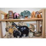 Quantity of elephant figures in wood and ceramic, also two elephant soft toys