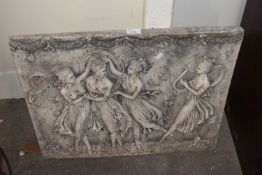 A reproduction plaster plaque of four maidens dancing, 64cm wide