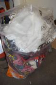 Large plastic bag containing a quantity of embroidery