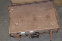 Vintage canvas covered suitcase