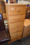 A pine six drawer chest of drawers, 127cm high