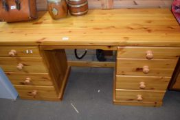 Pine twin pedestal desk, 139cm wide