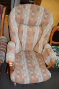 An upholstered rocking chair