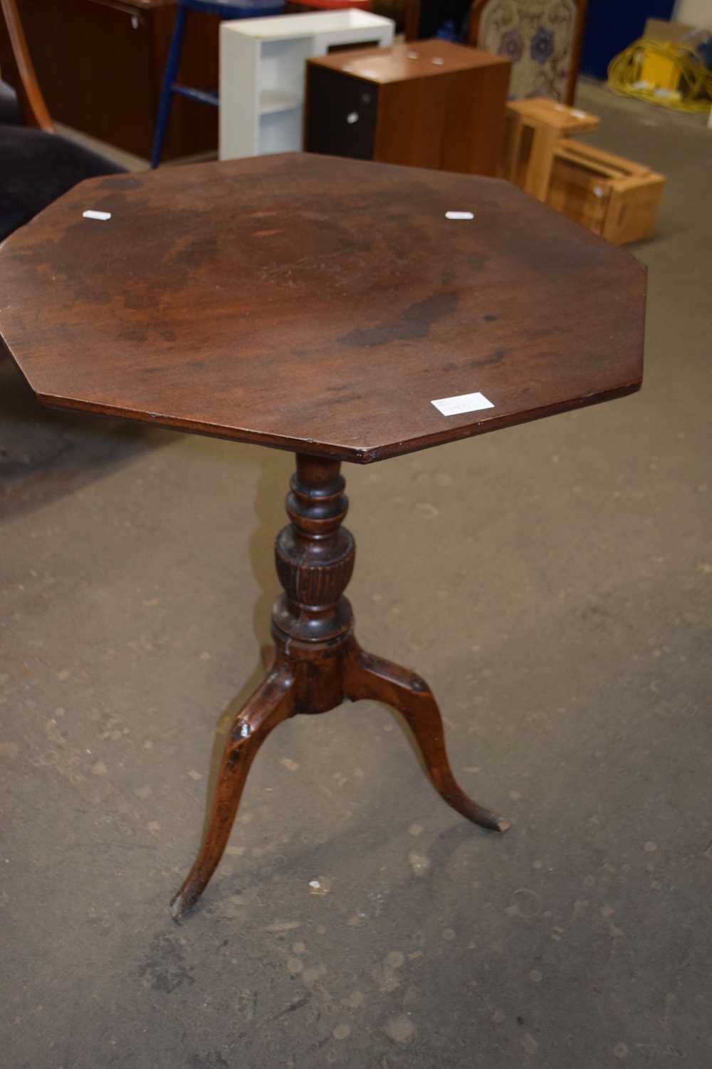 An octagonal tripod table, 55cm wide