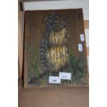 Wooden panel with a painted figure of a squirrel