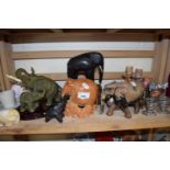 Further group of carved wooden elephants and other items