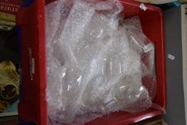 Plastic box containing a quantity of glass wares, wine glasses etc