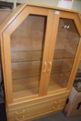 Modern glazed display cabinet with two drawers below, 89cm wide