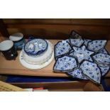 Set of ceramics, mugs, circular tray with small dishes in blue and white design