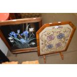 A needlework fire screen and a painted fire screen (2)