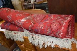 A large red ground rug