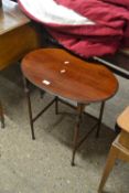 An oval mahogany occasional table