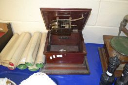 A vintage hardwood cased gramophone