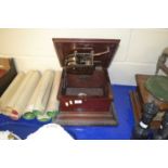 A vintage hardwood cased gramophone