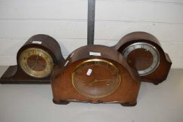 Three wooden mantel clocks