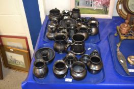Two trays of Prinknash pottery, jugs, tankards and other items