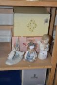 A collection of three small Lladro and Nao ornaments