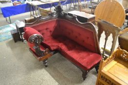 Victorian red upholstered corner seat with carved frame