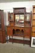 Late 19th Century American walnut side cabinet with mirrored back over a base with drawers and