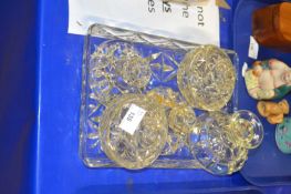 A glass dressing table set