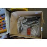 Box of oil cans and grease guns