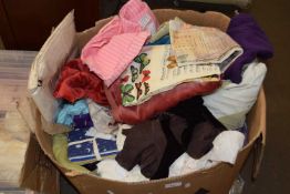 Large box of assorted fabrics