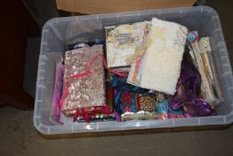 Box of assorted fabrics and crafting materials