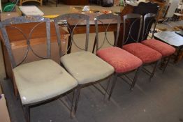 Five metal framed dining chairs