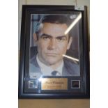 A framed and glazed presentation display, featuring an 8x10 headshot of Sean Connery as 007 James