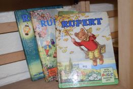 Four Rupert the Bear annuals