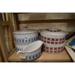 A quantity of mid 20th Century patterned ceramics to include two tureens, two dishes and a gravy