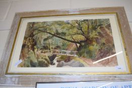 View of a river gorge with bridge within a forest, indistinctly signed, watercolour, framed and