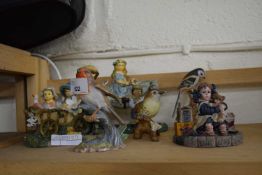 Five assorted figurines