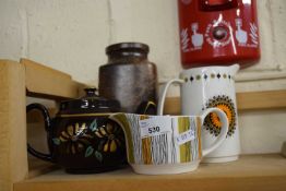 Mixed ceramics to include a Midwinter jug, another similar, a teapot and a vase (4)