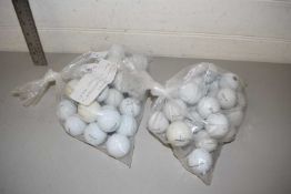 Two bags of Titleist golf balls