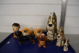 TRAY OF VARIOUS POTTERY DOGS TO INCLUDE SZEILER AND OTHERS, AND BESWICK