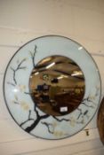 CIRCULAR WALL MIRROR IN FRAME WITH FLORAL DECORATION