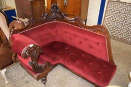 Victorian red upholstered corner seat with carved frame