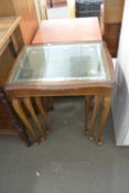 REPRODUCTION NEST OF THREE TABLES WITH LEATHER AND GLASS TOP, LARGEST 50CM WIDE