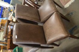 Set of four modern leather upholstered dining chairs