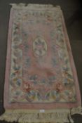 PINK GROUND CHINESE RUG, APPROX 130CM LONG