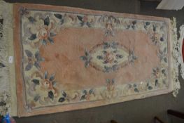 PEACH GROUND CHINESE STYLE RUG, 139CM LONG